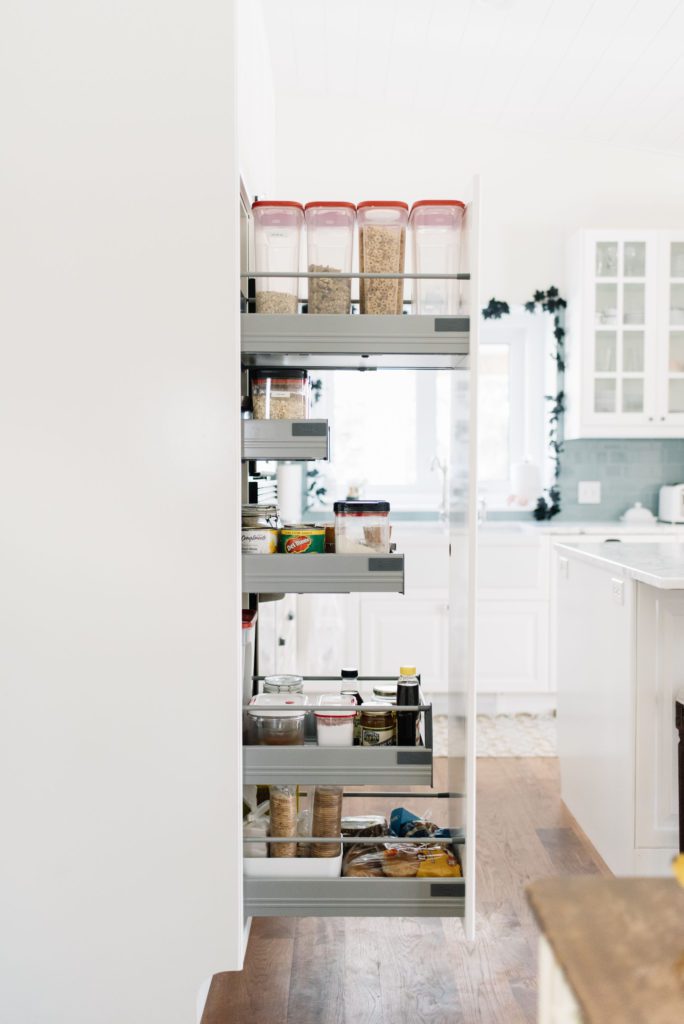 Pull out pantry cupboards add much needed storage in a small kitchen