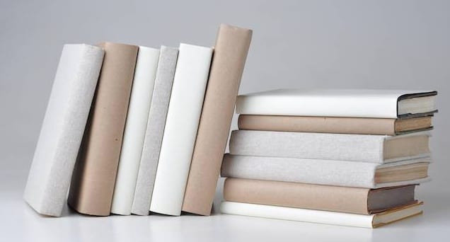 Jacket covers on books allow for a uniform appearance on a bookshelf