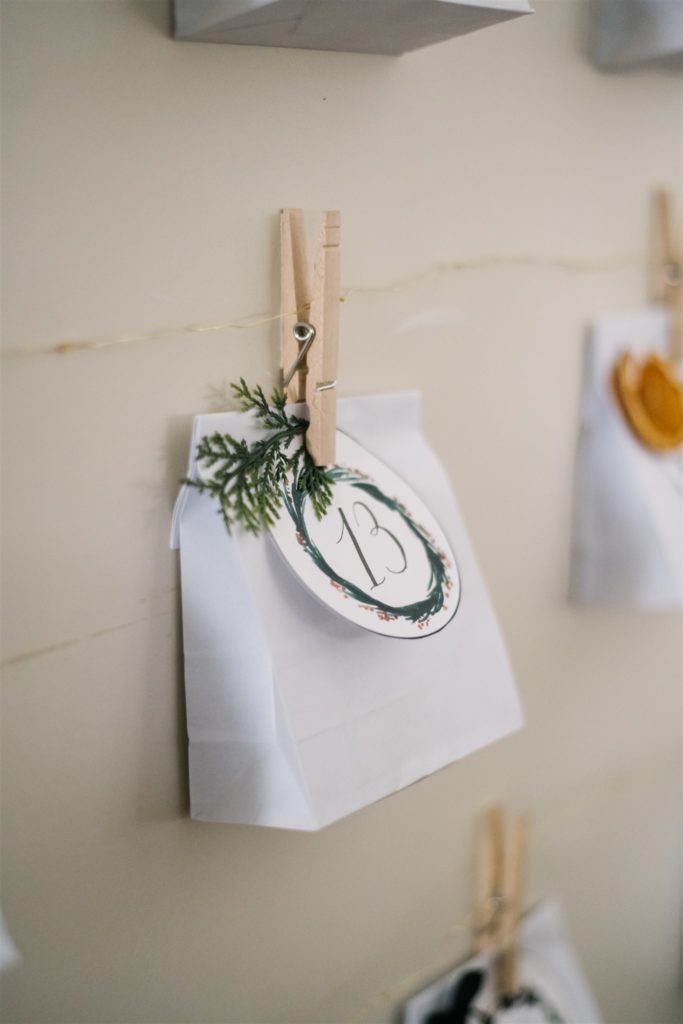 DIY christmas advent calendar paper bags attached with clothes peg
