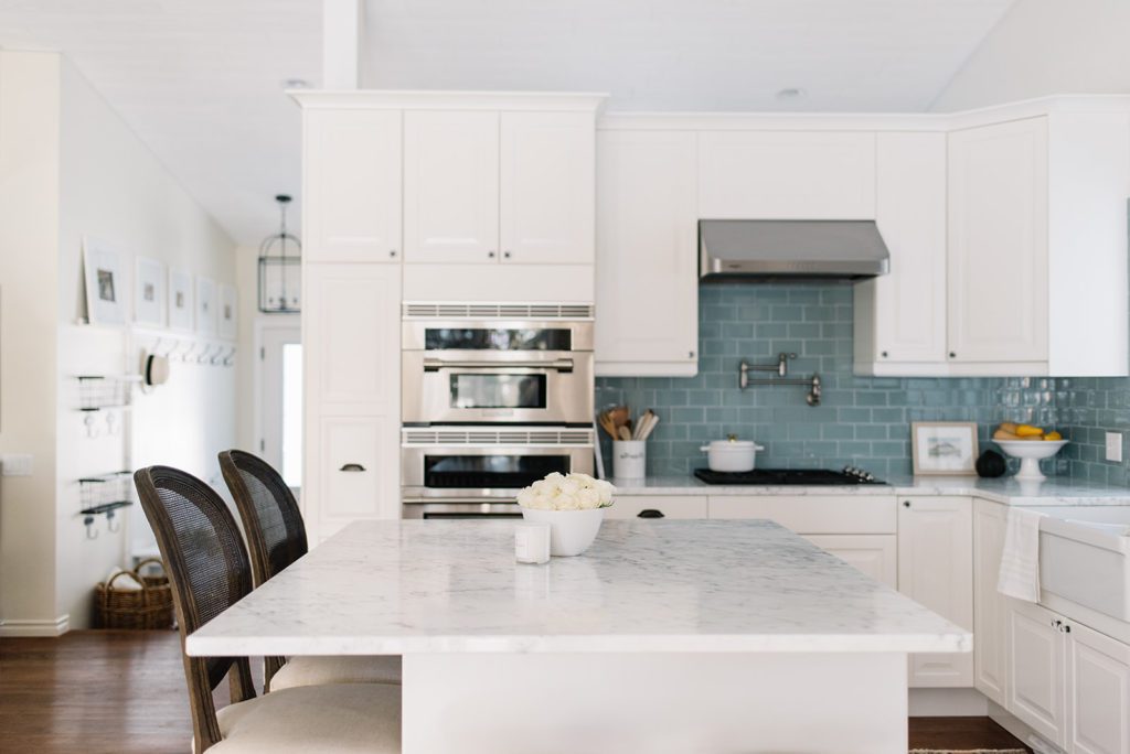 kitchen with a large marble countertop on the island