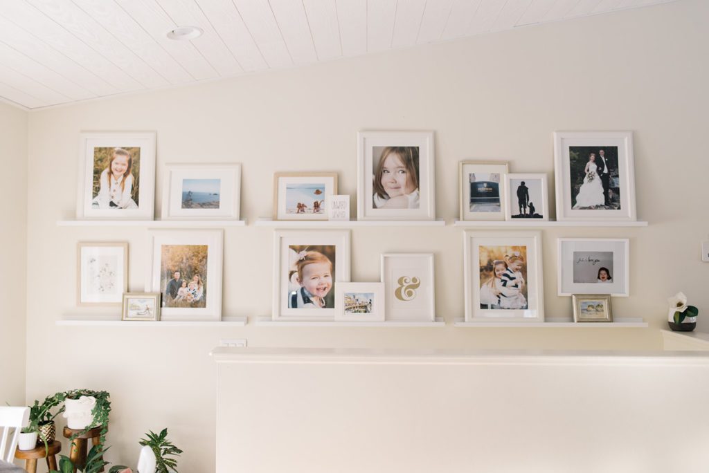 Gallery wall with white picture frames