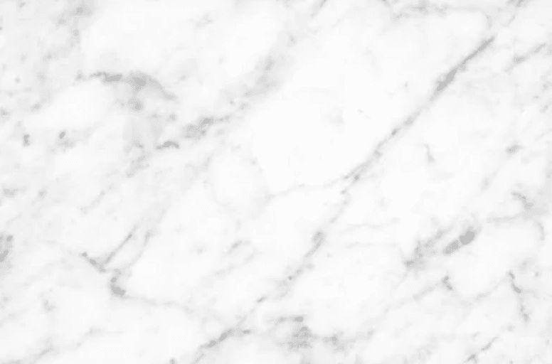 A close up of a Carrara marble counter 