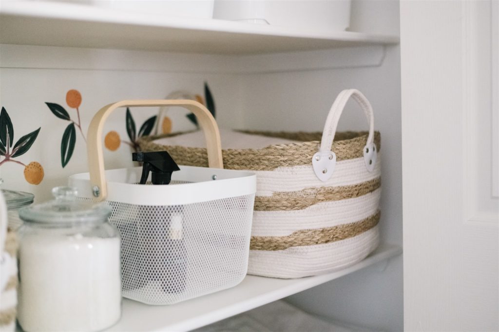 closeup of baskets in linen closet